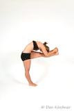 bikram-yoga-coquitlam-posture05-standing-head-to-knee-pose-04-s